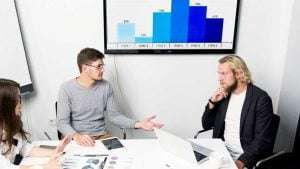 Marketing team discussing video marketing strategy to build brand awareness