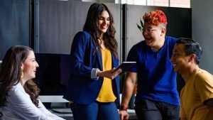 Marketing team discusses marketing metrics with marketing manager